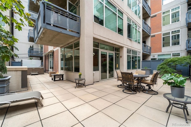 view of patio / terrace with a jacuzzi