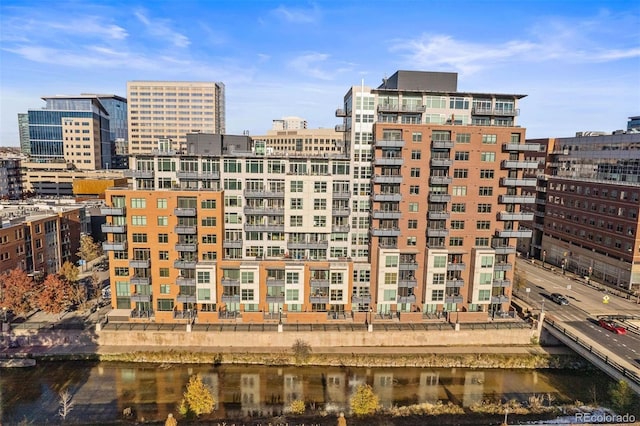 view of building exterior with a water view