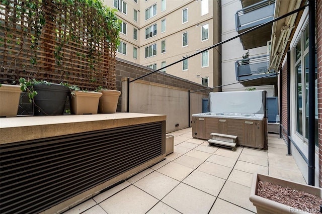 view of patio with a hot tub