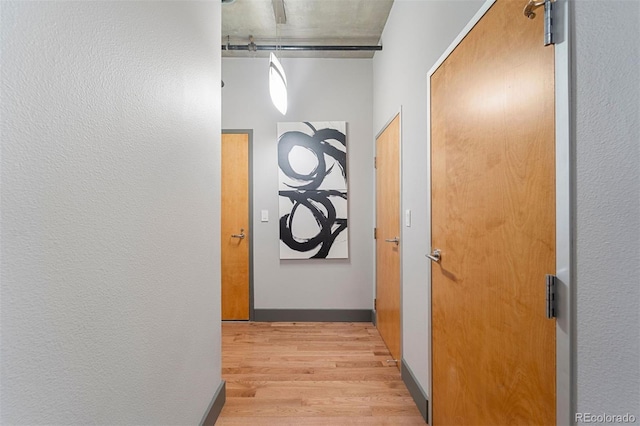 hallway featuring light hardwood / wood-style floors