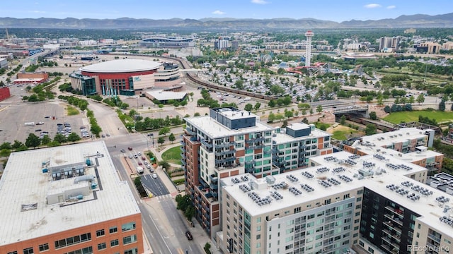 birds eye view of property featuring a mountain view