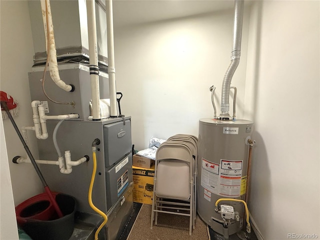 183 E Ave, Limon, CO 80828 - utility room featuring gas water heater and heating unit