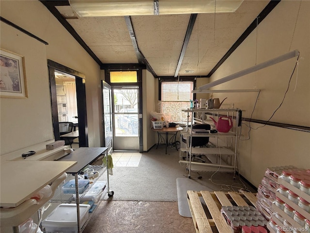 183 E Ave, Limon, CO 80828 - misc room with vaulted ceiling and carpet flooring