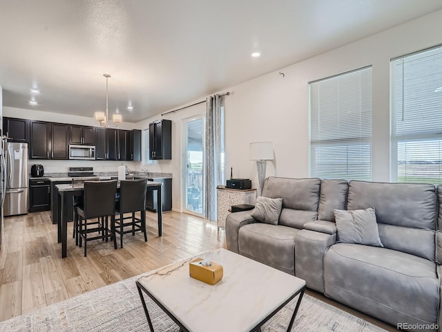 living room with light hardwood / wood-style floors