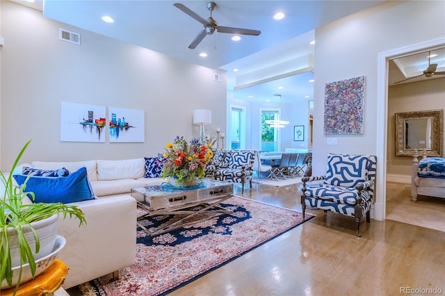 living area featuring visible vents, wood finished floors, ceiling fan, and recessed lighting
