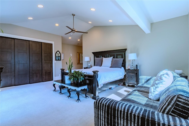 carpeted bedroom featuring a closet, lofted ceiling, and recessed lighting