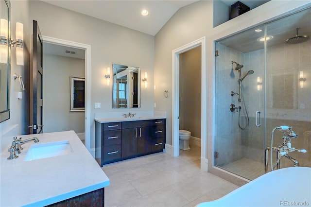 full bath featuring toilet, visible vents, a shower stall, tile patterned floors, and vanity