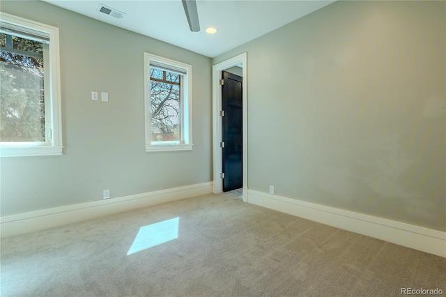 unfurnished bedroom with carpet flooring, baseboards, visible vents, and recessed lighting