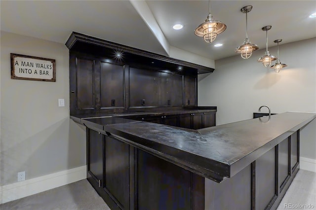 bar with recessed lighting, baseboards, and decorative light fixtures