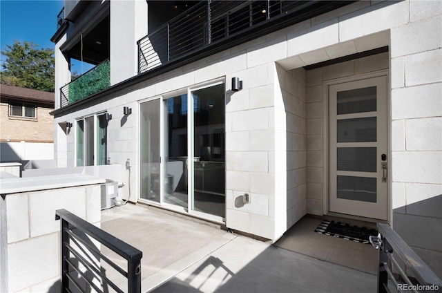 7861 W 51st Ave Unit B, Arvada, CO 80002 - doorway to property with a patio area