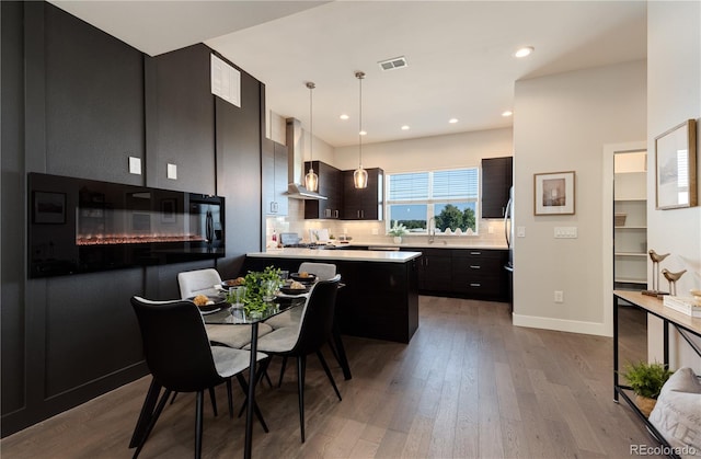 7861 W 51st Ave Unit B, Arvada, CO 80002 - dining area featuring wood finished floors and recessed lighting