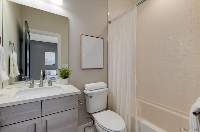 7861 W 51st Ave Unit B, Arvada, CO 80002 - bathroom featuring vanity and shower / bath combo with shower curtain