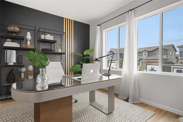 8028 Williams Fork Ave, Littleton, CO 80125 - home office featuring wood finished floors and baseboards