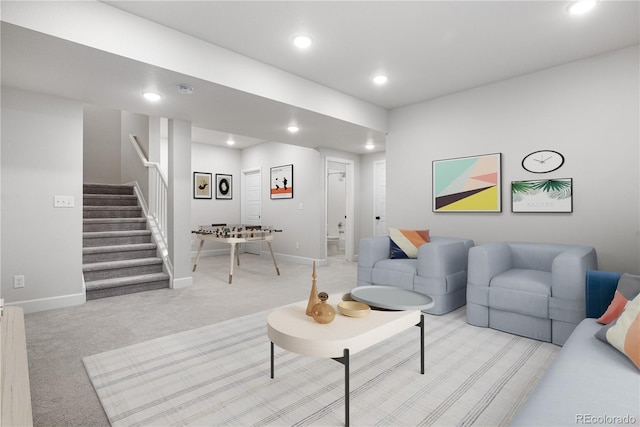 8028 Williams Fork Ave, Littleton, CO 80125 - living room featuring recessed lighting, stairway, and light colored carpet