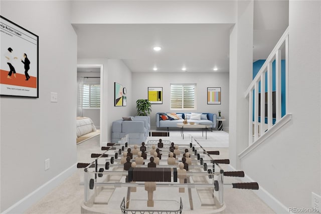 8028 Williams Fork Ave, Littleton, CO 80125 - carpeted living room featuring baseboards and recessed lighting