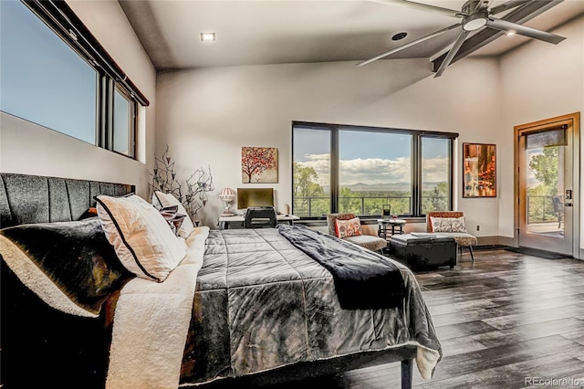 bedroom with dark wood-type flooring, access to outside, multiple windows, and baseboards