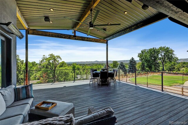 deck with ceiling fan, an outdoor hangout area, and outdoor dining space