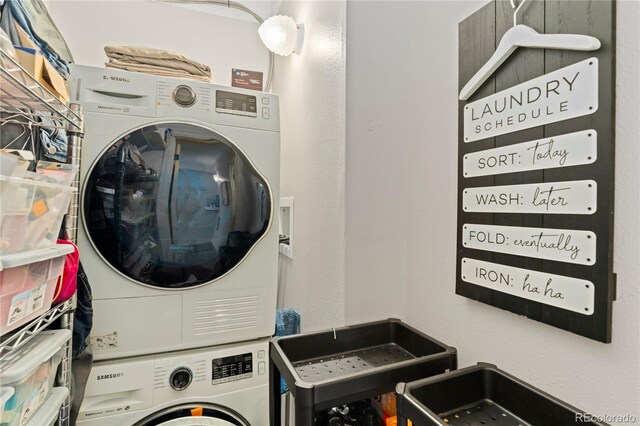 1265 Race St Unit 203, Denver, CO 80206 - laundry area with stacked washer / drying machine