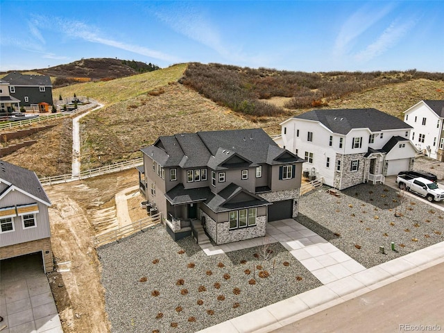 aerial view with a mountain view and a residential view