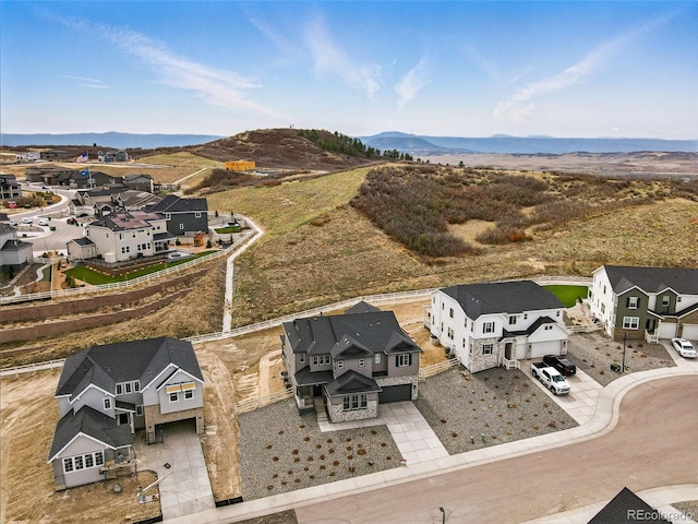bird's eye view with a mountain view and a residential view