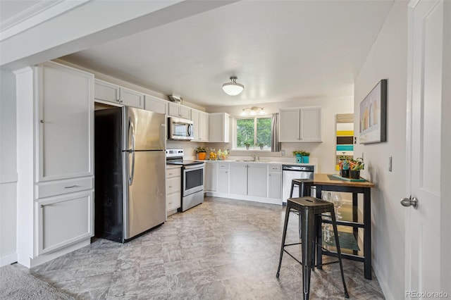 5645 W 5th Ave Unit 5645 & 5655, Lakewood, CO 80226 - kitchen with appliances with stainless steel finishes and light countertops