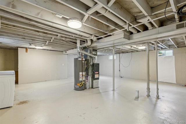 5645 W 5th Ave Unit 5645 & 5655, Lakewood, CO 80226 - basement featuring gas water heater, washer / clothes dryer, and heating unit