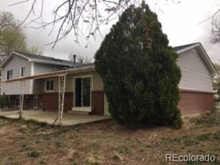 206 Cielo Vista St, Colorado Springs, CO 80911 - back of house featuring a patio