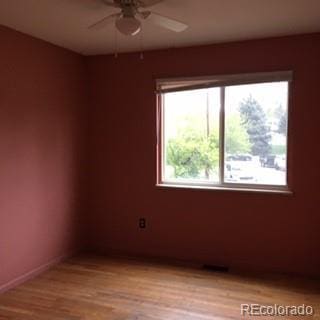 206 Cielo Vista St, Colorado Springs, CO 80911 - unfurnished room featuring light wood-style floors, a ceiling fan, and baseboards