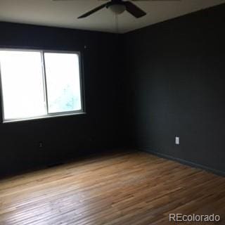 206 Cielo Vista St, Colorado Springs, CO 80911 - unfurnished room with ceiling fan, wood finished floors, and baseboards