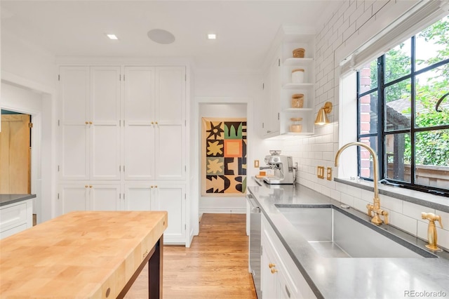 1226 Dexter St, Denver, CO 80220 - kitchen with white cabinets, a sink, open shelves, plenty of natural light, and recessed lighting