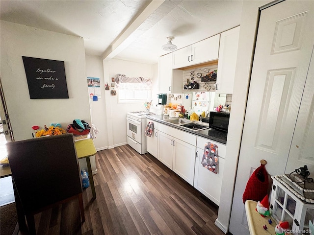 605 E Rio Blanco Ave, Rangely, CO 81648 - kitchen with white range with gas cooktop, black microwave, white cabinets, dark wood-type flooring, and beam ceiling