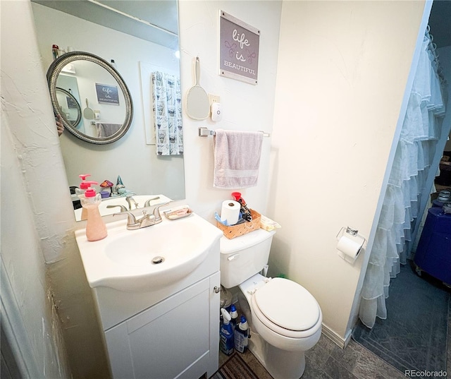 605 E Rio Blanco Ave, Rangely, CO 81648 - bathroom with toilet and vanity