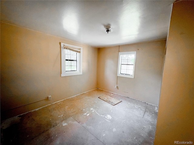 605 E Rio Blanco Ave, Rangely, CO 81648 - empty room featuring healthy amount of natural light