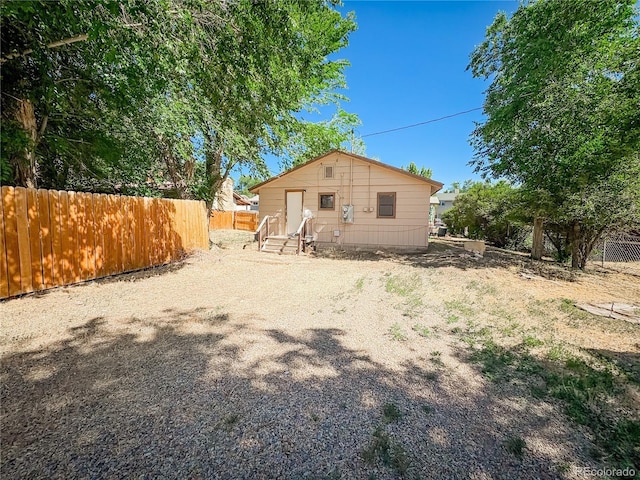 605 E Rio Blanco Ave, Rangely, CO 81648 - rear view of house featuring entry steps