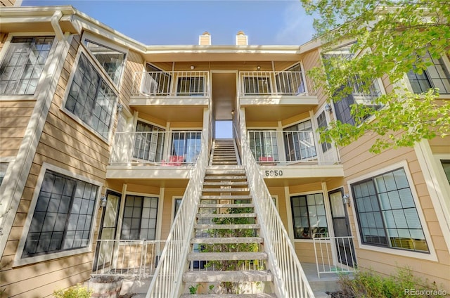 view of building exterior with stairs