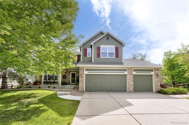 view of front of house with a garage, driveway, brick siding, and a front yard