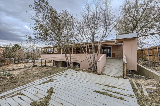 deck with a sunroom