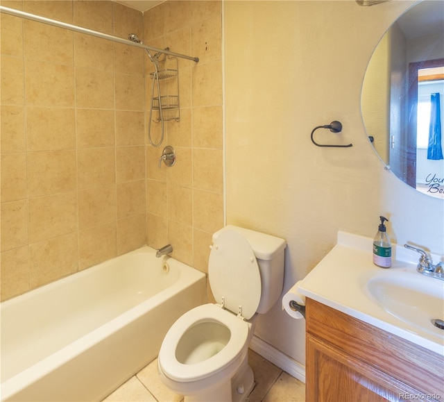 full bathroom featuring toilet, tile patterned flooring, tiled shower / bath, and vanity