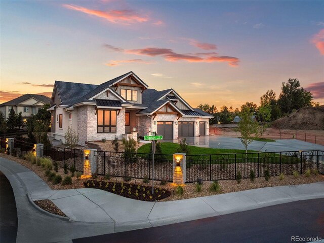 craftsman inspired home with a garage