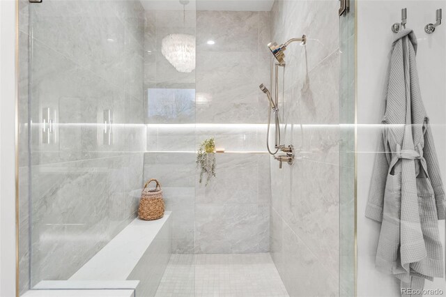 bathroom featuring tiled shower