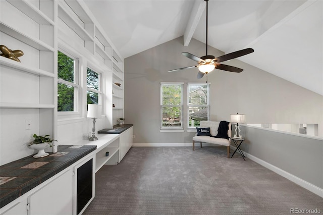 11245 San Joaquin Rdg, Littleton, CO 80127 - living area featuring carpet floors, baseboards, and a ceiling fan