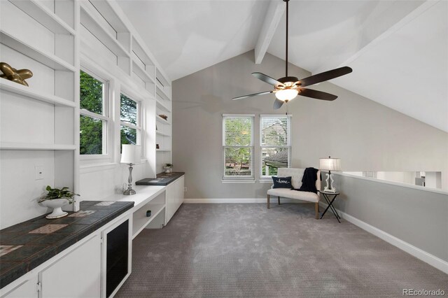11245 San Joaquin Rdg, Littleton, CO 80127 - living area featuring carpet floors, baseboards, and a ceiling fan