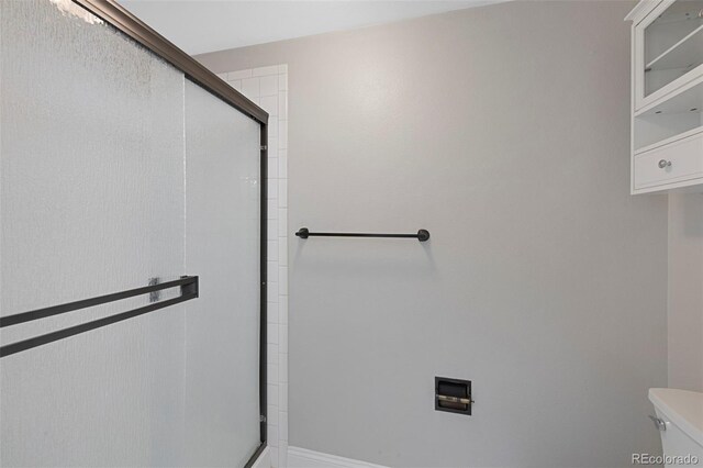 11245 San Joaquin Rdg, Littleton, CO 80127 - bathroom with a shower stall and toilet