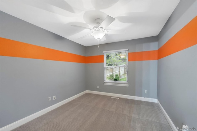 11245 San Joaquin Rdg, Littleton, CO 80127 - carpeted spare room featuring ceiling fan and baseboards