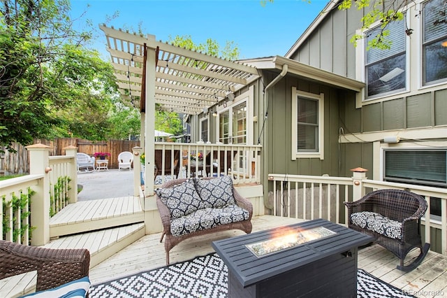 11245 San Joaquin Rdg, Littleton, CO 80127 - wooden terrace featuring a fire pit, a pergola, and fence