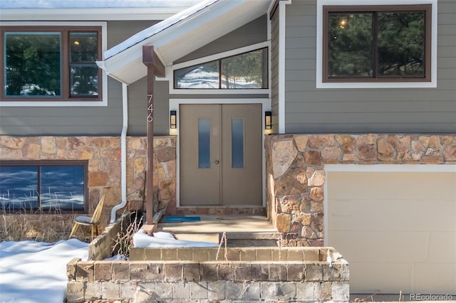 entrance to property featuring a garage