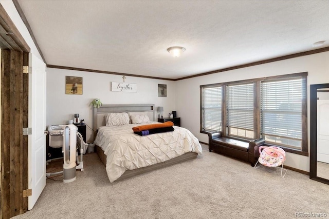 bedroom with light carpet, a textured ceiling, baseboards, and crown molding