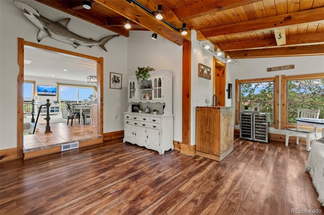 1380 Oak Valley Rd, Sedalia, CO 80135 - living room featuring wine cooler, dark wood-style flooring, and a wood ceiling with exposed beams