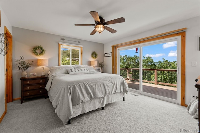 1380 Oak Valley Rd, Sedalia, CO 80135 - carpeted bedroom with access to outside and a ceiling fan