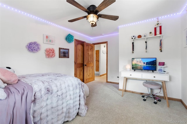 1380 Oak Valley Rd, Sedalia, CO 80135 - carpeted bedroom with baseboards and ceiling fan